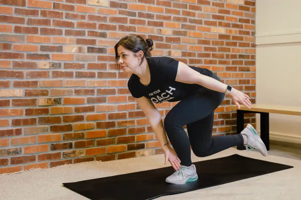 Tone Your Arms in Just One Week: Achieve Results Without the Gym! 1 A person exercising their arms at home with light weights Northwood