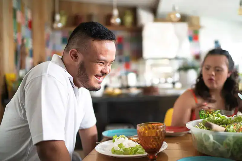 Empowering Weight Loss: A Comprehensive Guide for Individuals with Disabilities 2 Image of a disabled man and balance around nutrition to aid weight loss Northwood