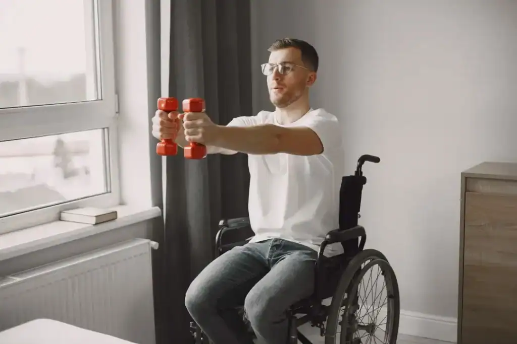 Image of man doing exercise in his wheelchair to aid weight loss Northwood