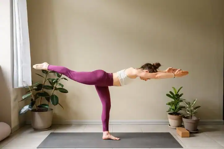 Achieving the Perfect Tone: How Often Should You Exercise for Results? 1 Woman doing Yoga exercise Northwood to help with toning the body.